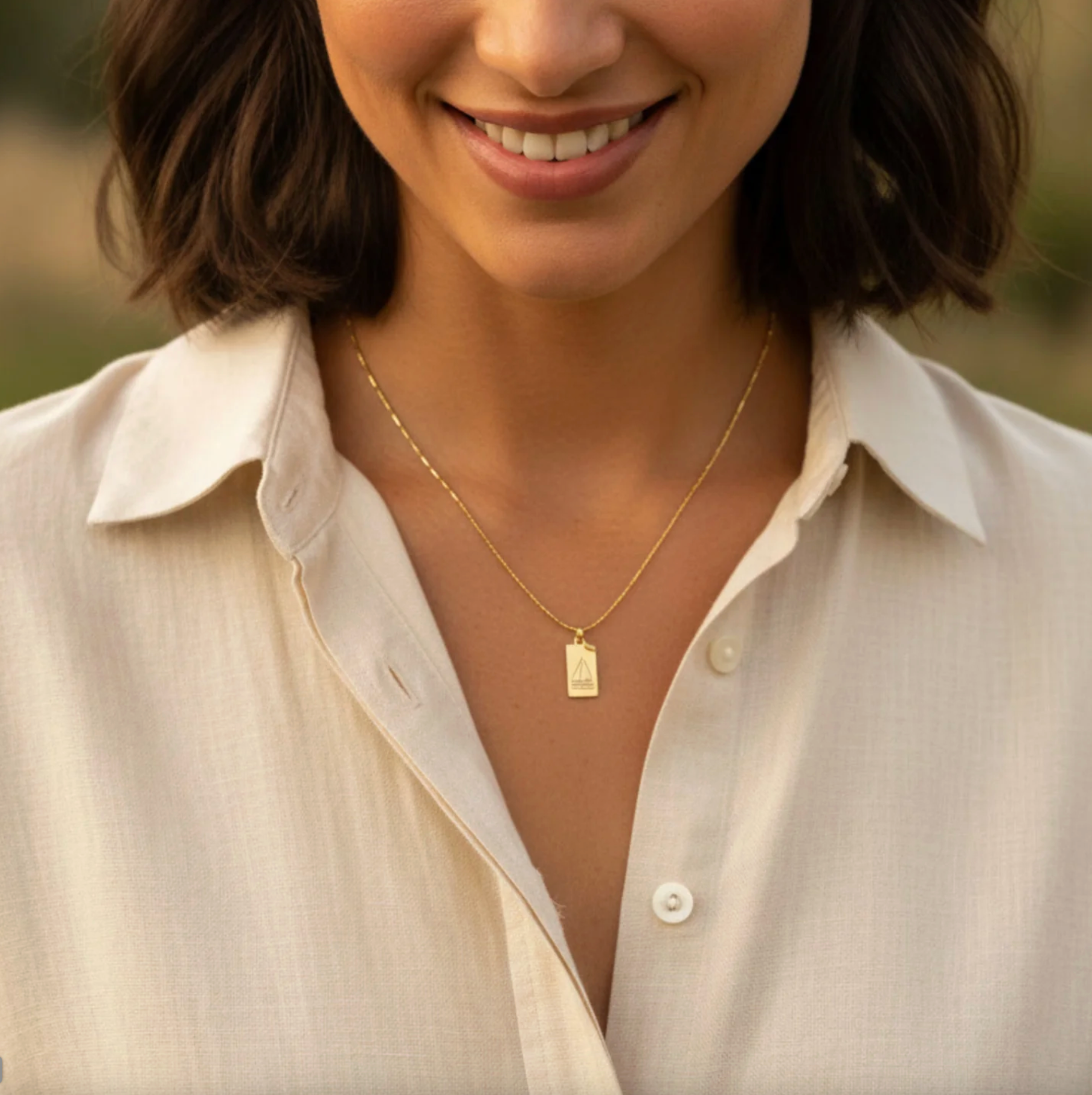 STORYTELLER BOAT NECKLACE
